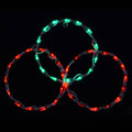 Red and green three-circle commercial LED peak topper on a dark background