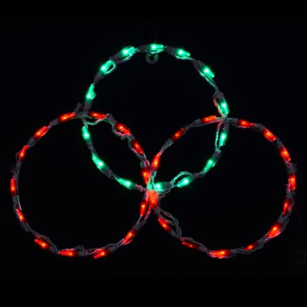 Red and green three-circle commercial LED peak topper on a dark background