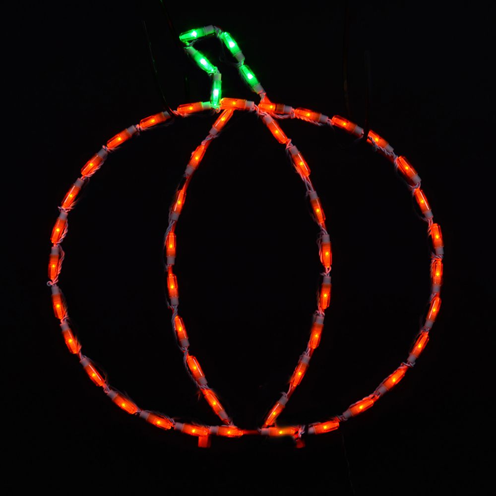 Orange and green 19-inch commercial LED pumpkin display on a dark background